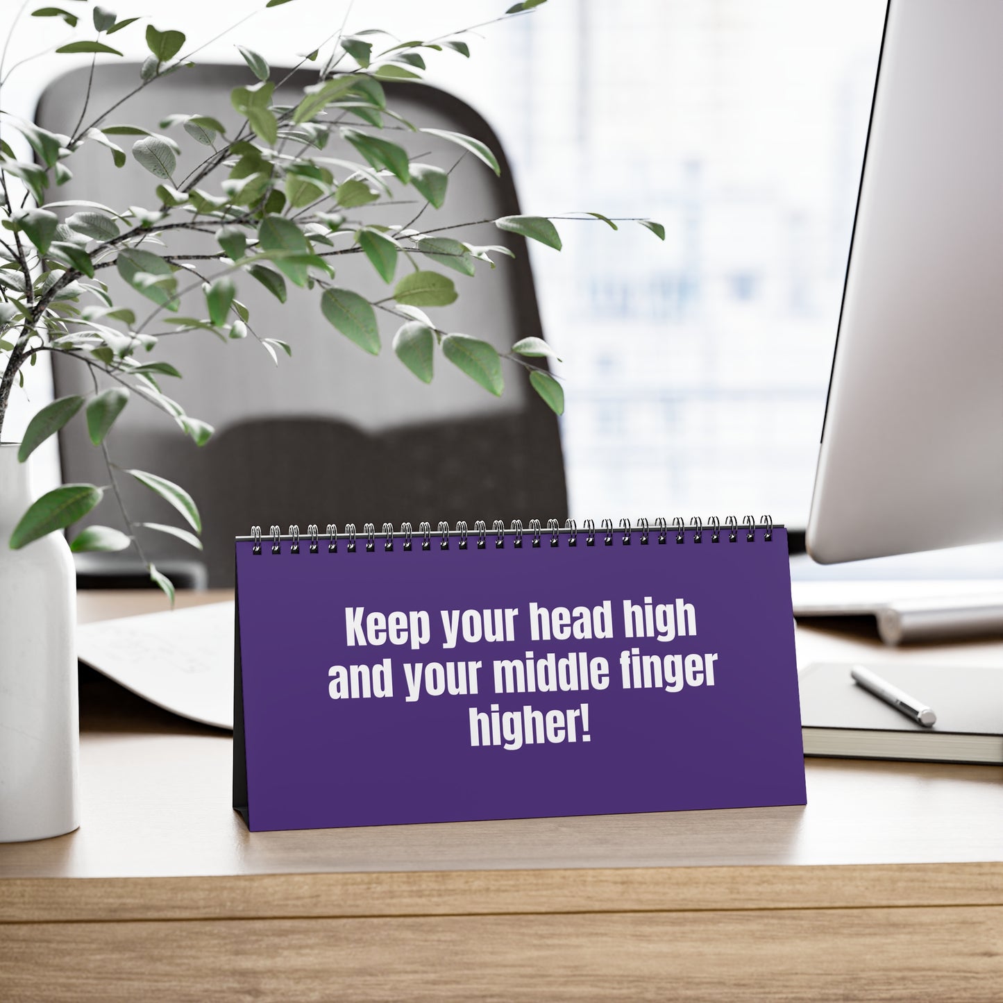 Funny black desk sign reading ‘Straighten Your F*cking Crown’ on the table