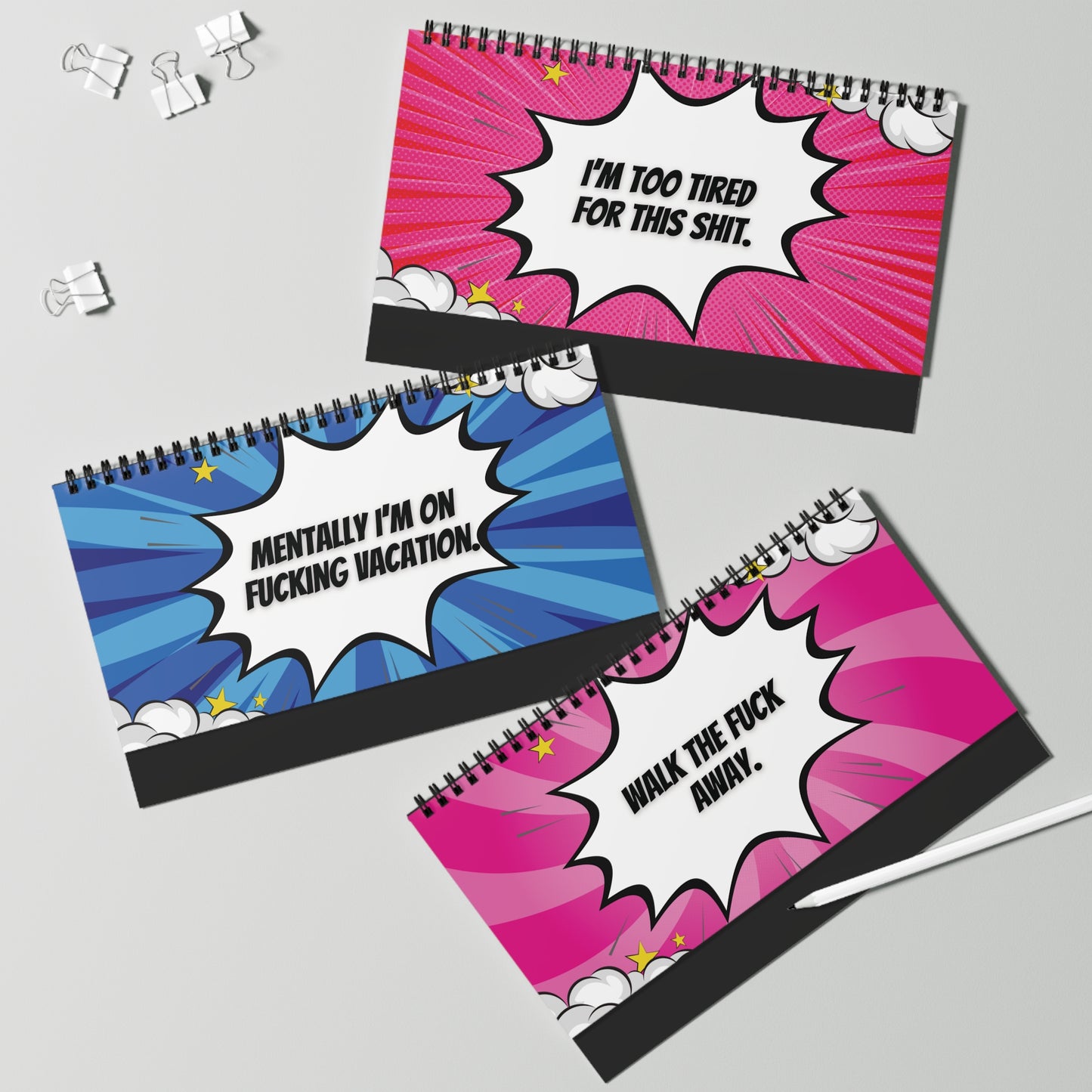 Three desk sign pages with colorful comic-style text on a gray background