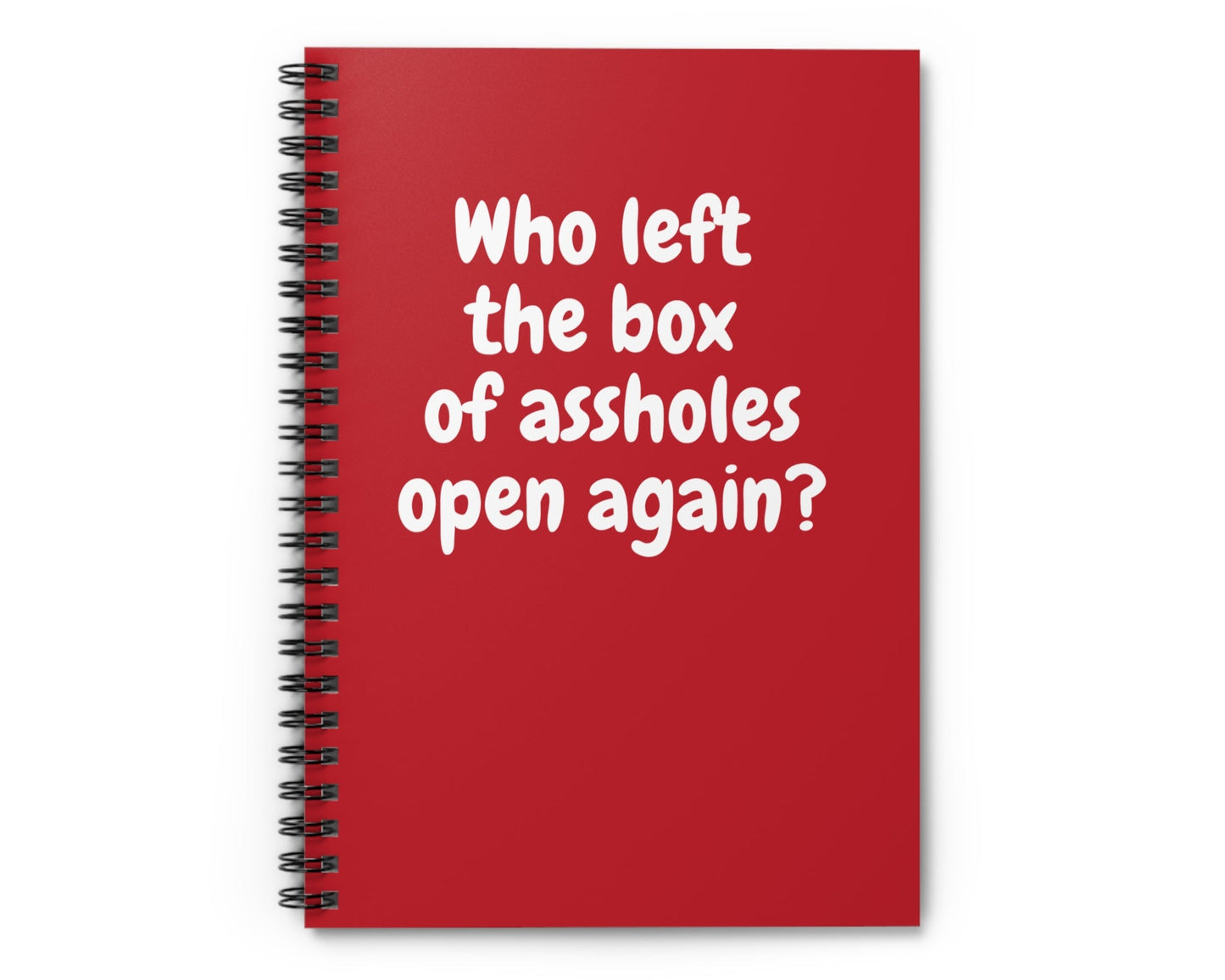 dark red spiral notebook with sarcastic “Who left the box of assholes open again?” quote