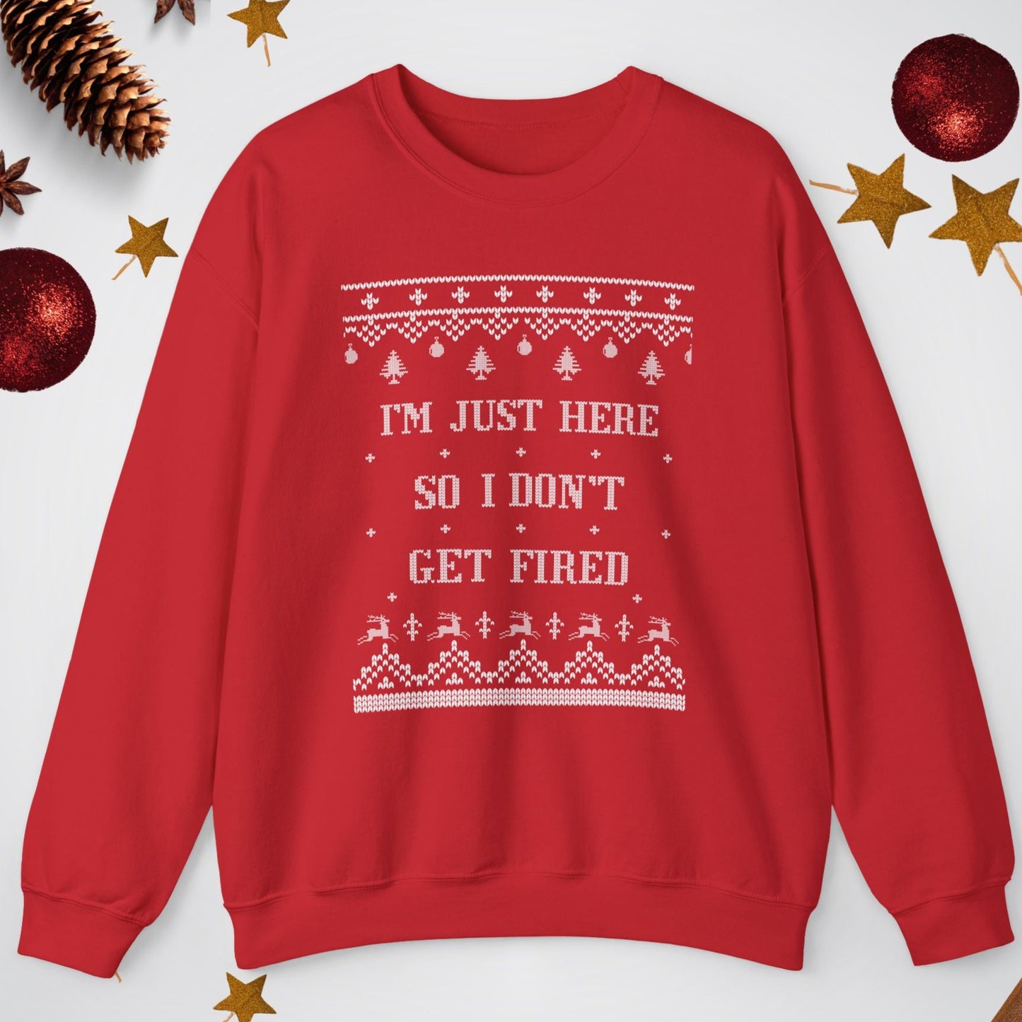 Red sweater with Christmas-themed text and decorations on a white background