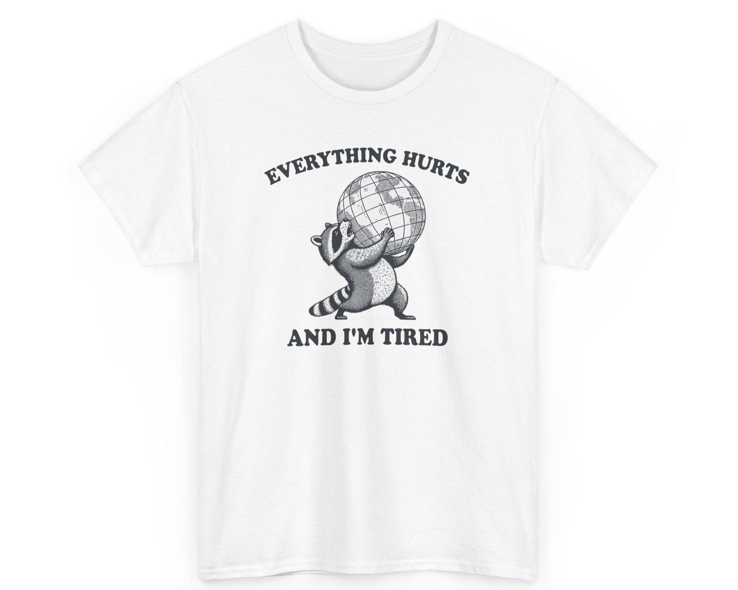White unisex tee with a tired raccoon and the phrase 'Everything Hurts and I’m Tired,' ideal for anyone feeling exhausted by life.
