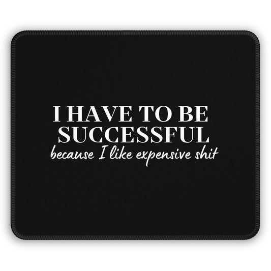 Flat: Black mouse pad with bold “I Have to Be Successful Because I Like Expensive Shit” quote