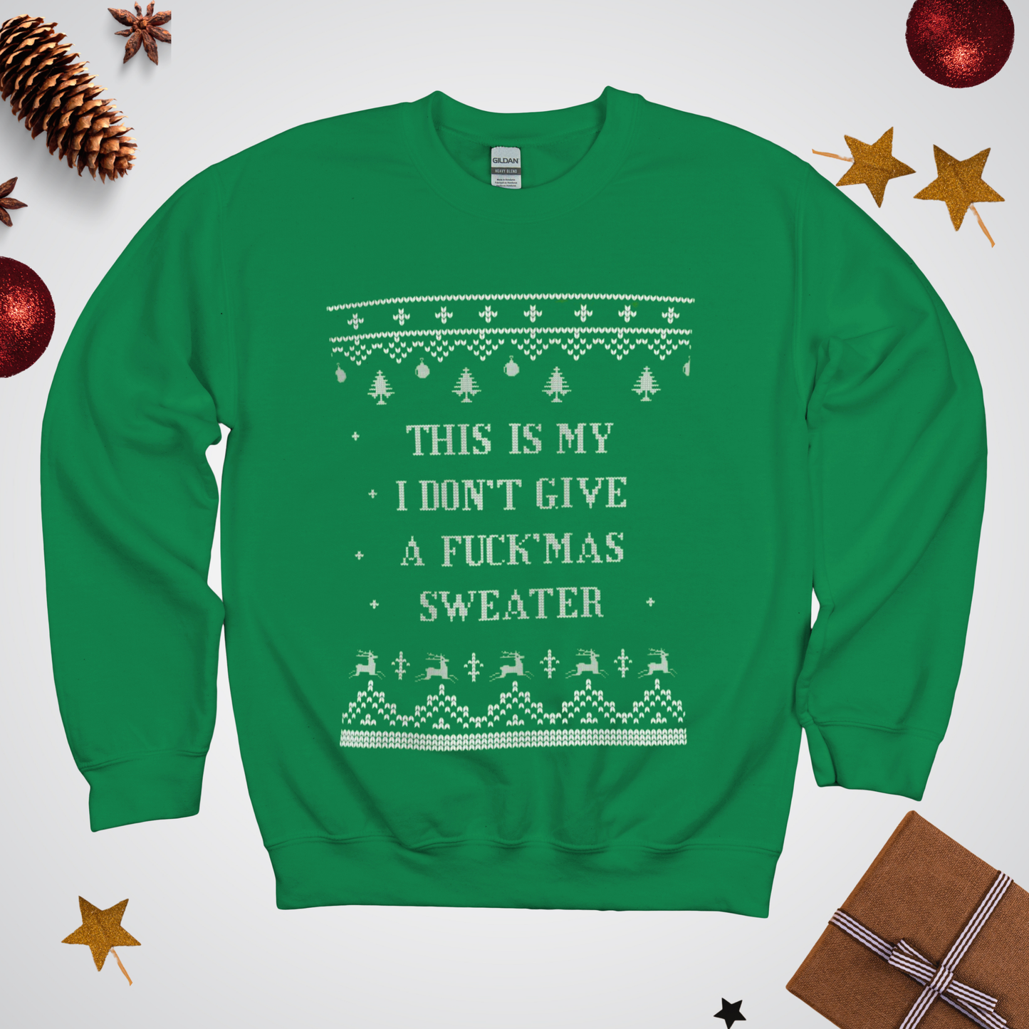 Green sweater with Christmas-themed text and patterns on a white background with festive decorations.