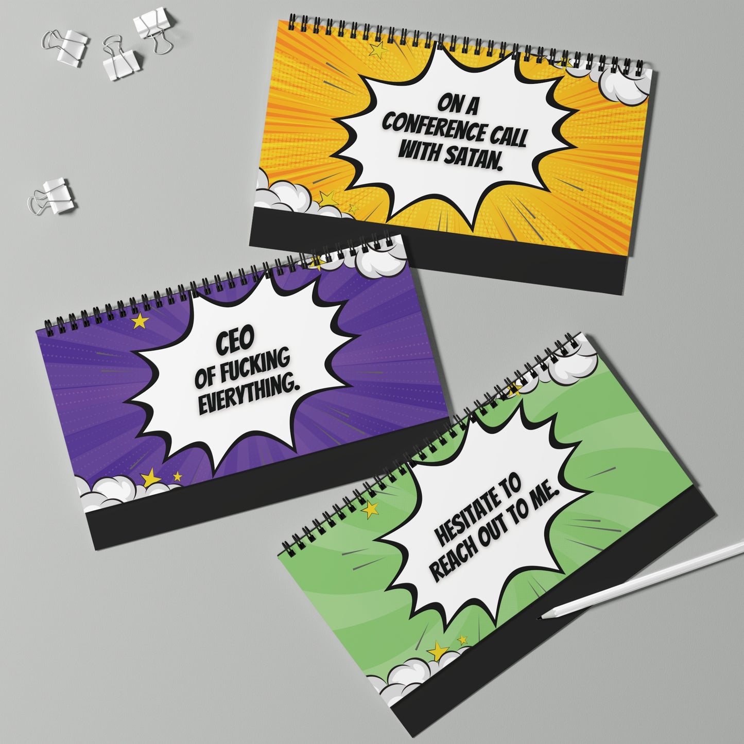 pages with colorful covers and text on a gray background