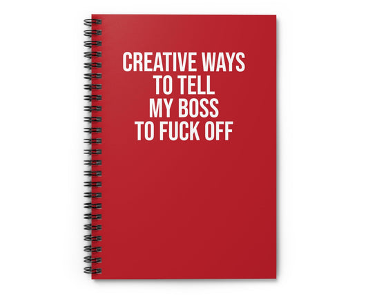 Red notebook with white text on a white background