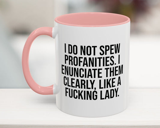 Pink 11oz mug with funny sarcastic quote: 'I do not spew profanities. I enunciate them clearly, like a fucking lady.' Perfect for office humor.