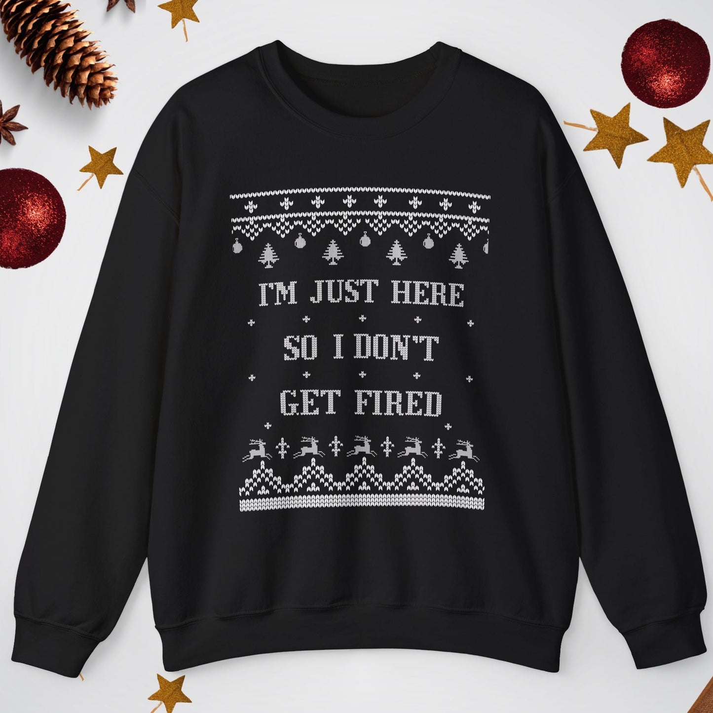 Black sweatshirt with text and patterns on a light gray background with decorative elements.