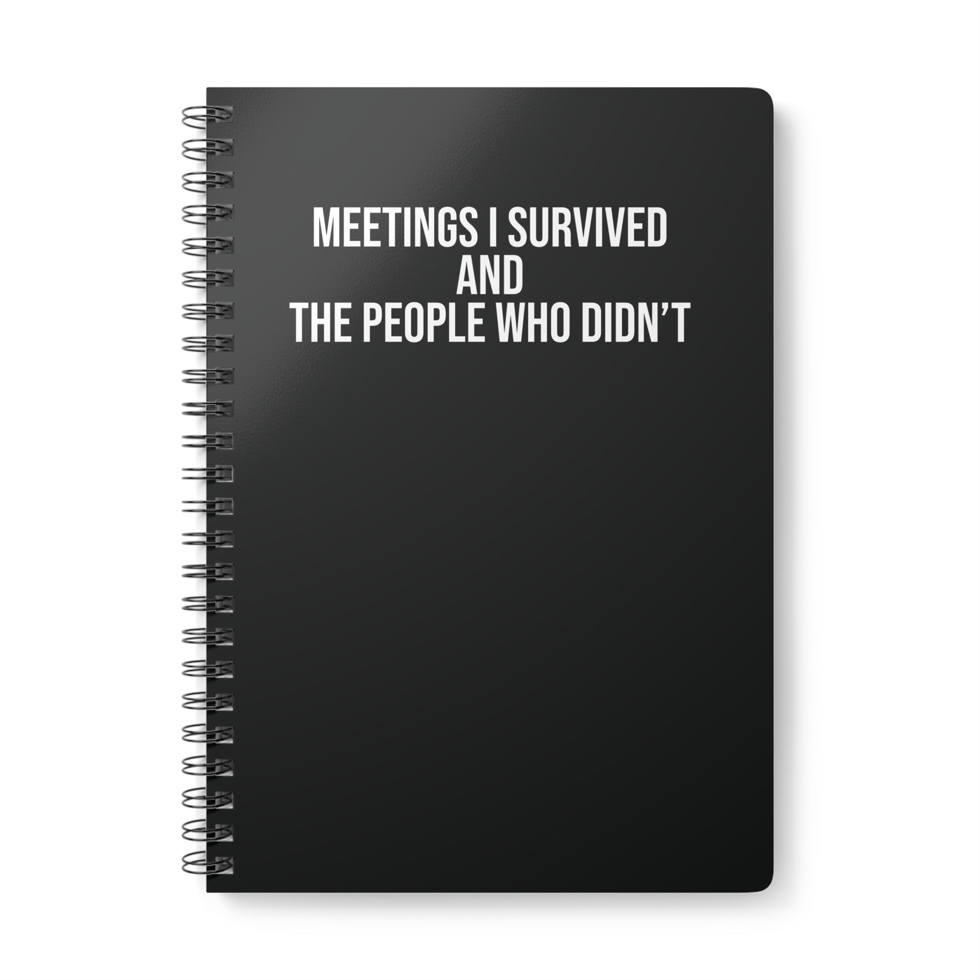 Black notebook with white text on a white background