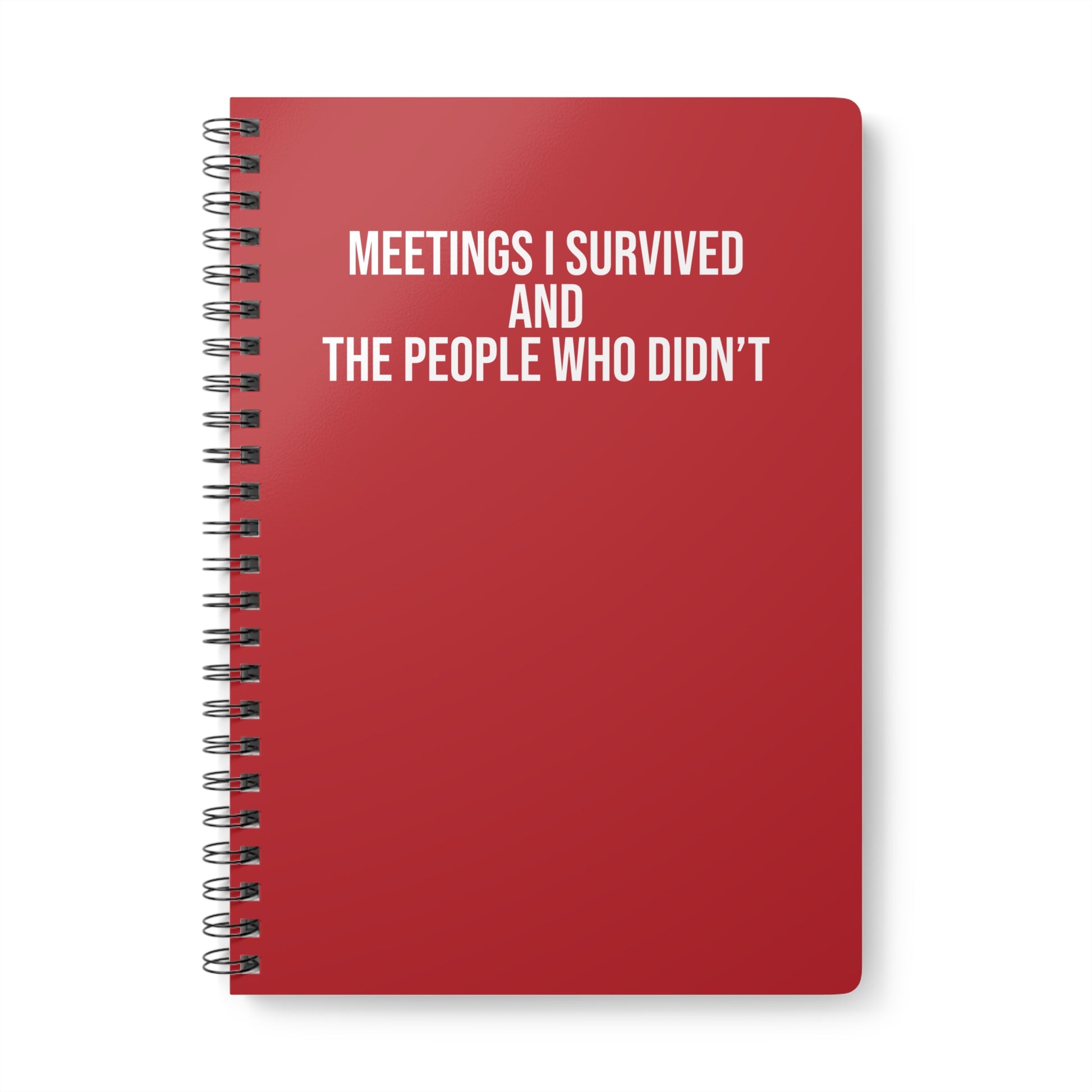 Red notebook with white text on a white background