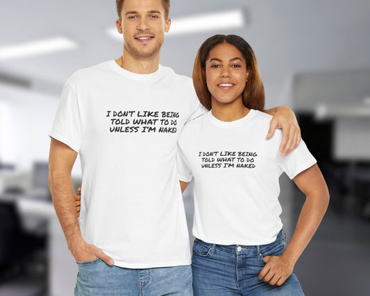 Man and Woman wearing white funny quote t-shirt styled for casual office wear