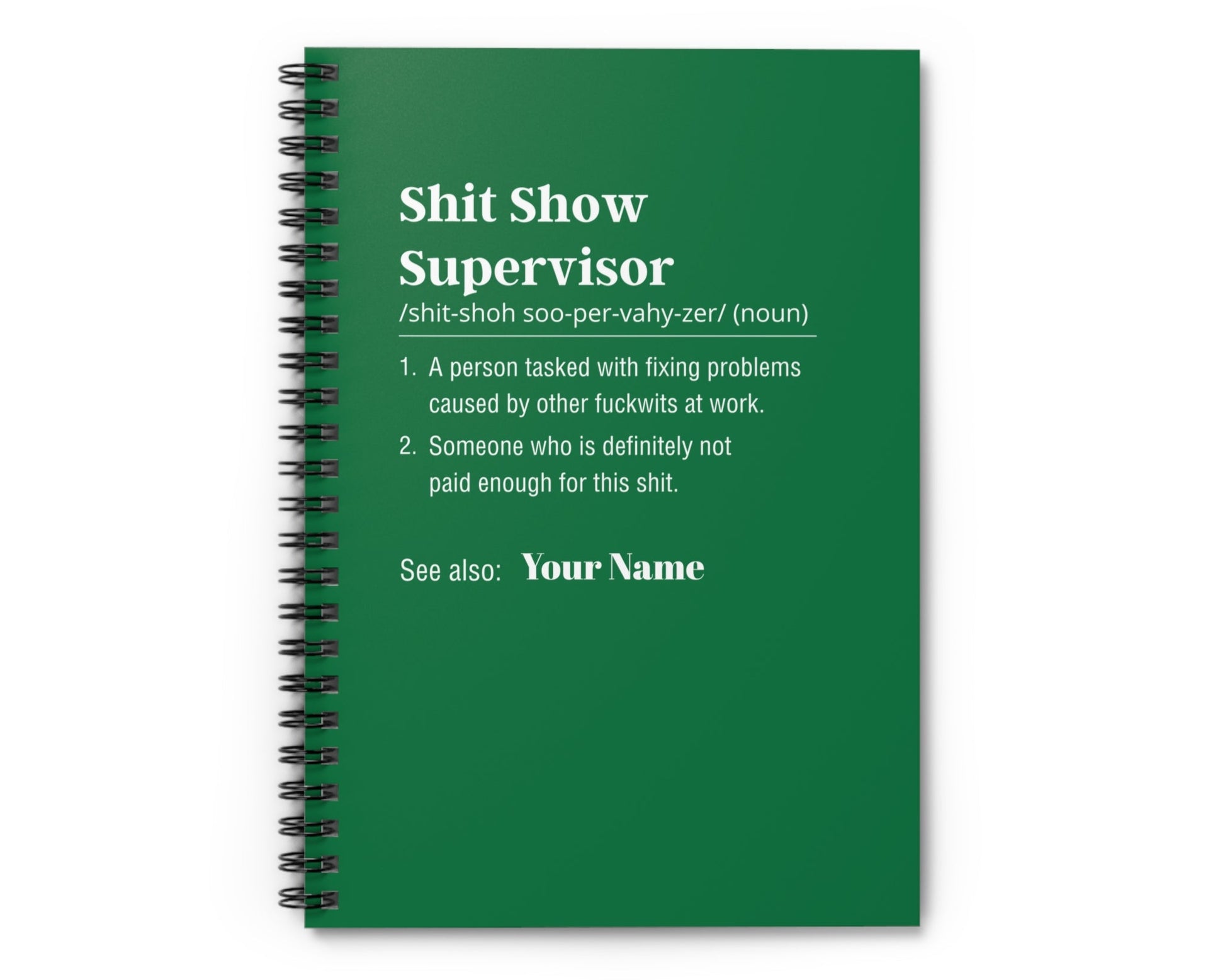 Green notebook with text definition on a white background