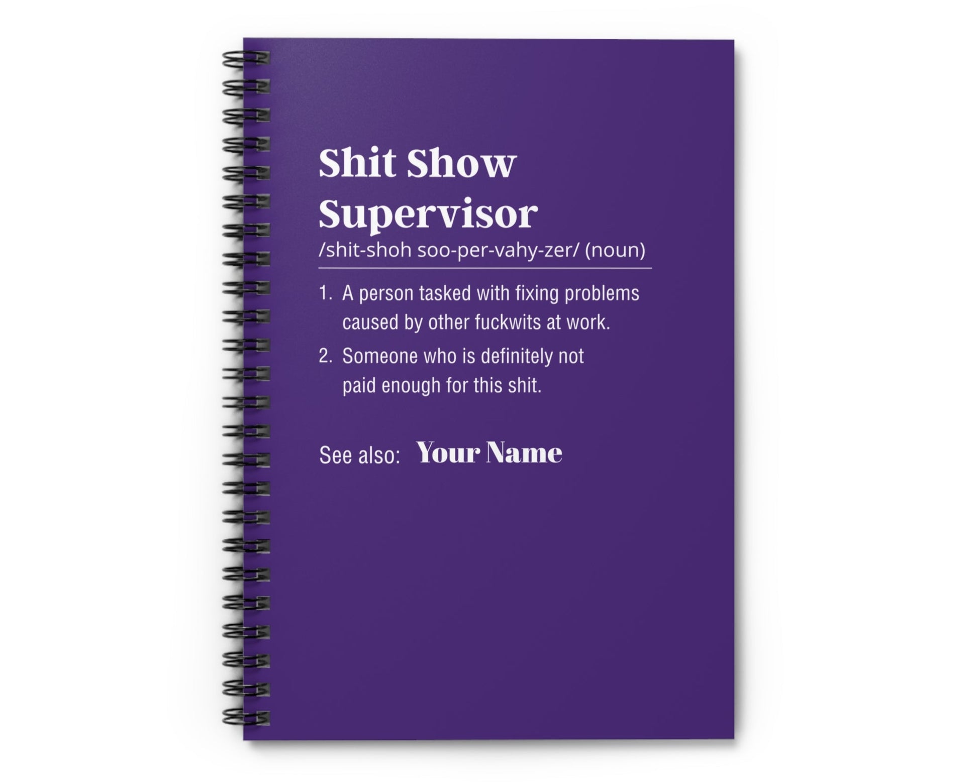 Purple notebook with text definition on a white background
