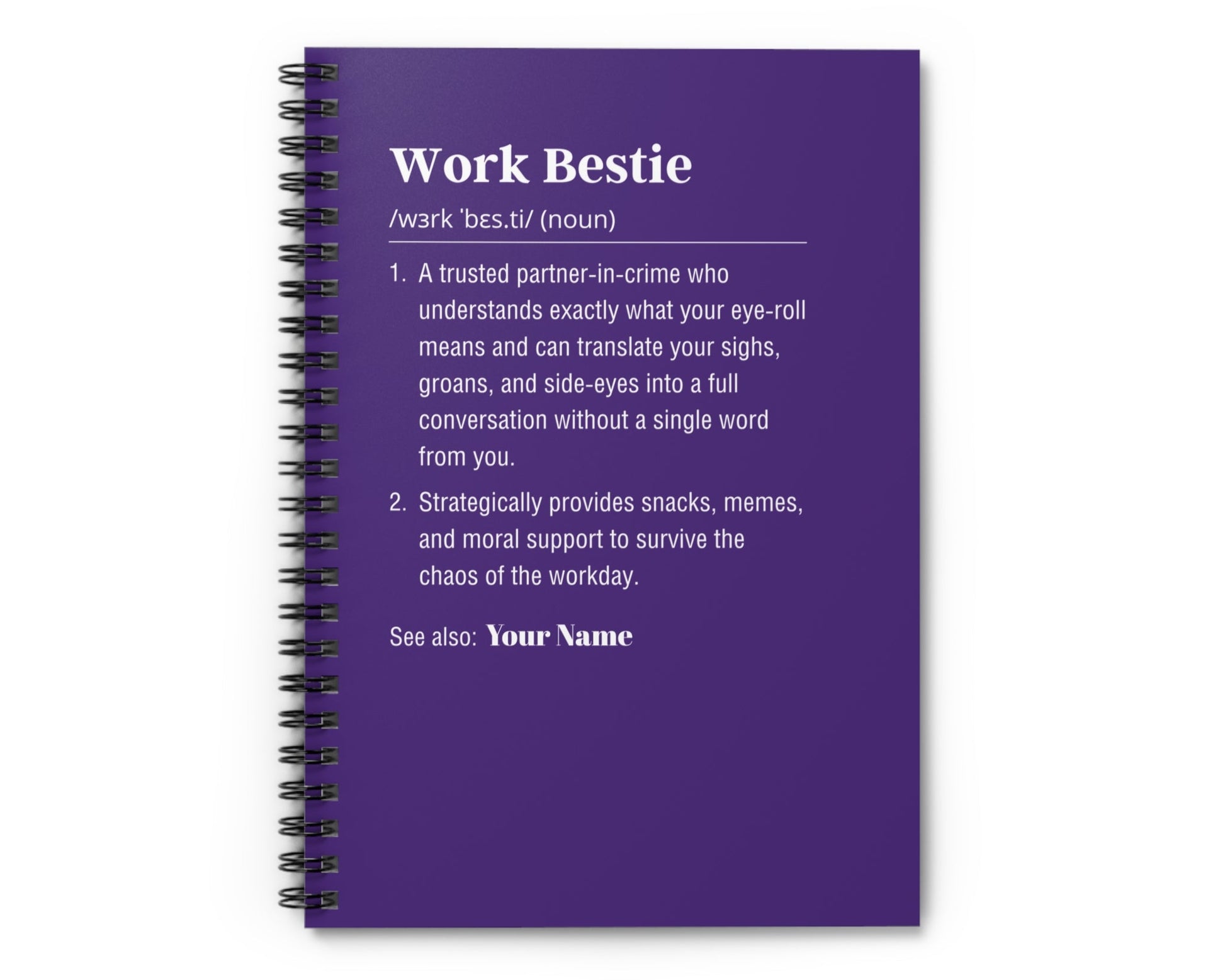 Purple notebook with text definition of 'Work Bestie' on a white background