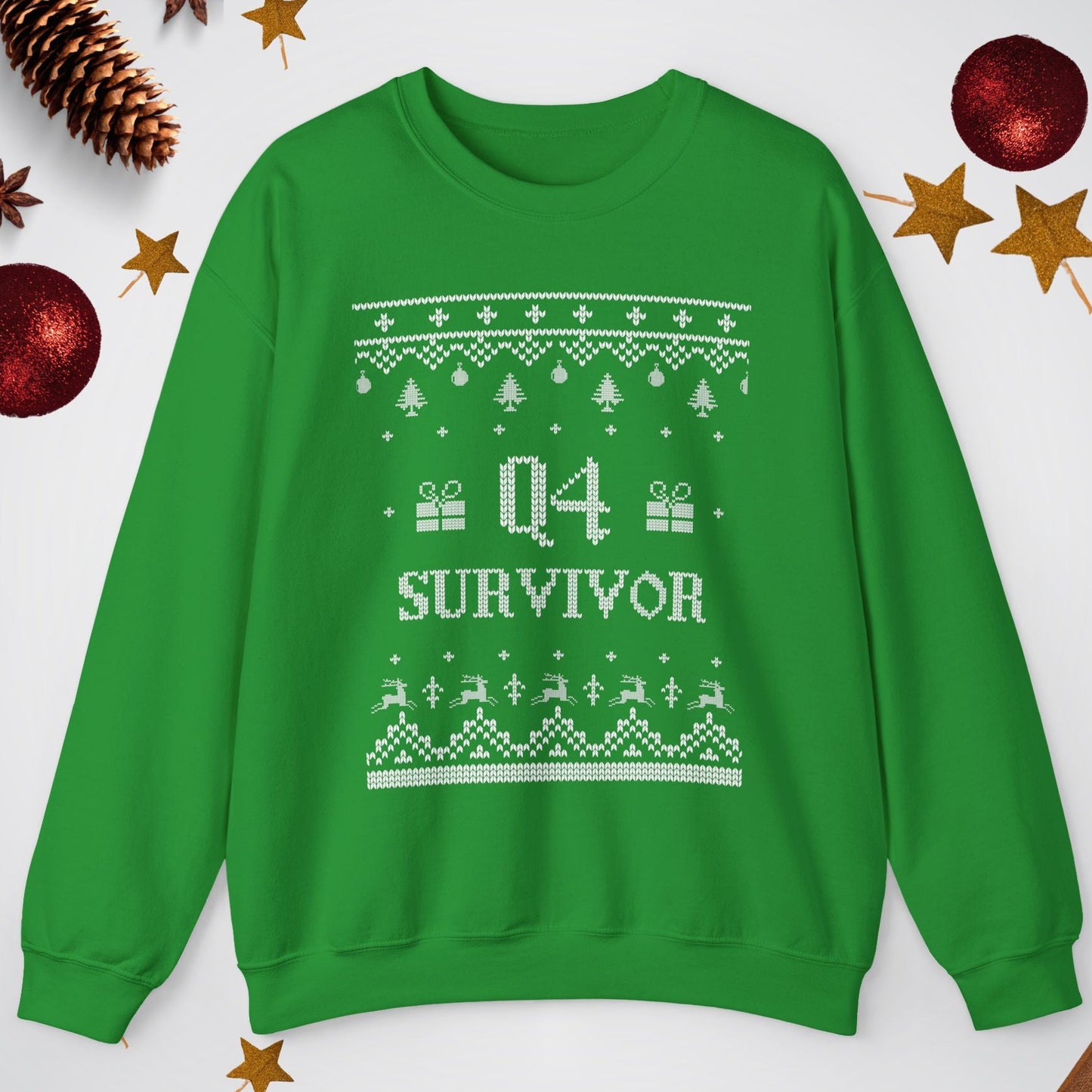 Green sweatshirt with 'Q4 Survivor' text on a white background with Christmas decorations.