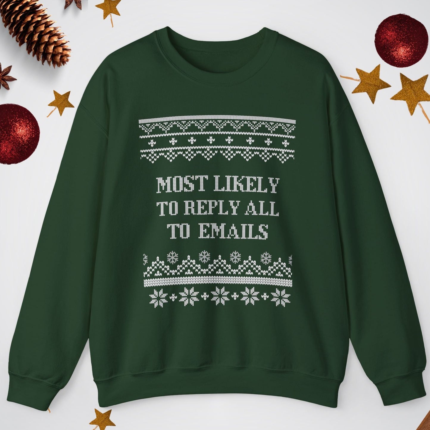 Green sweatshirt with text and patterns on a white background with decorative items.