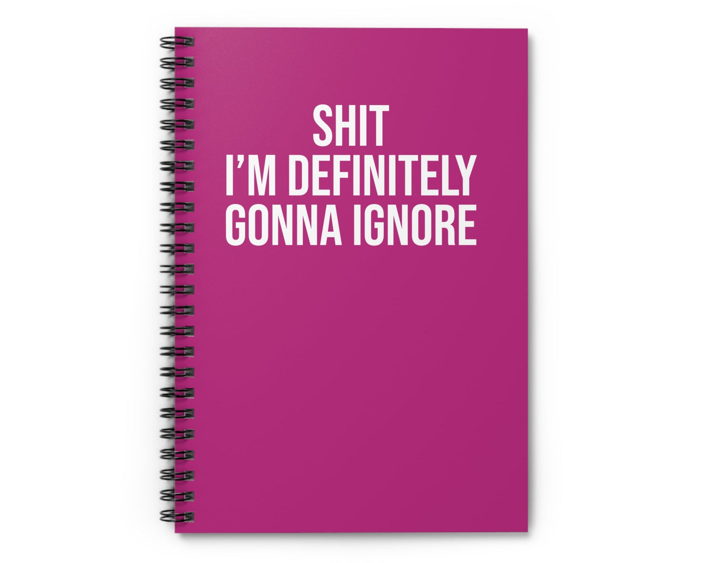 Pink notebook with white text on a white background