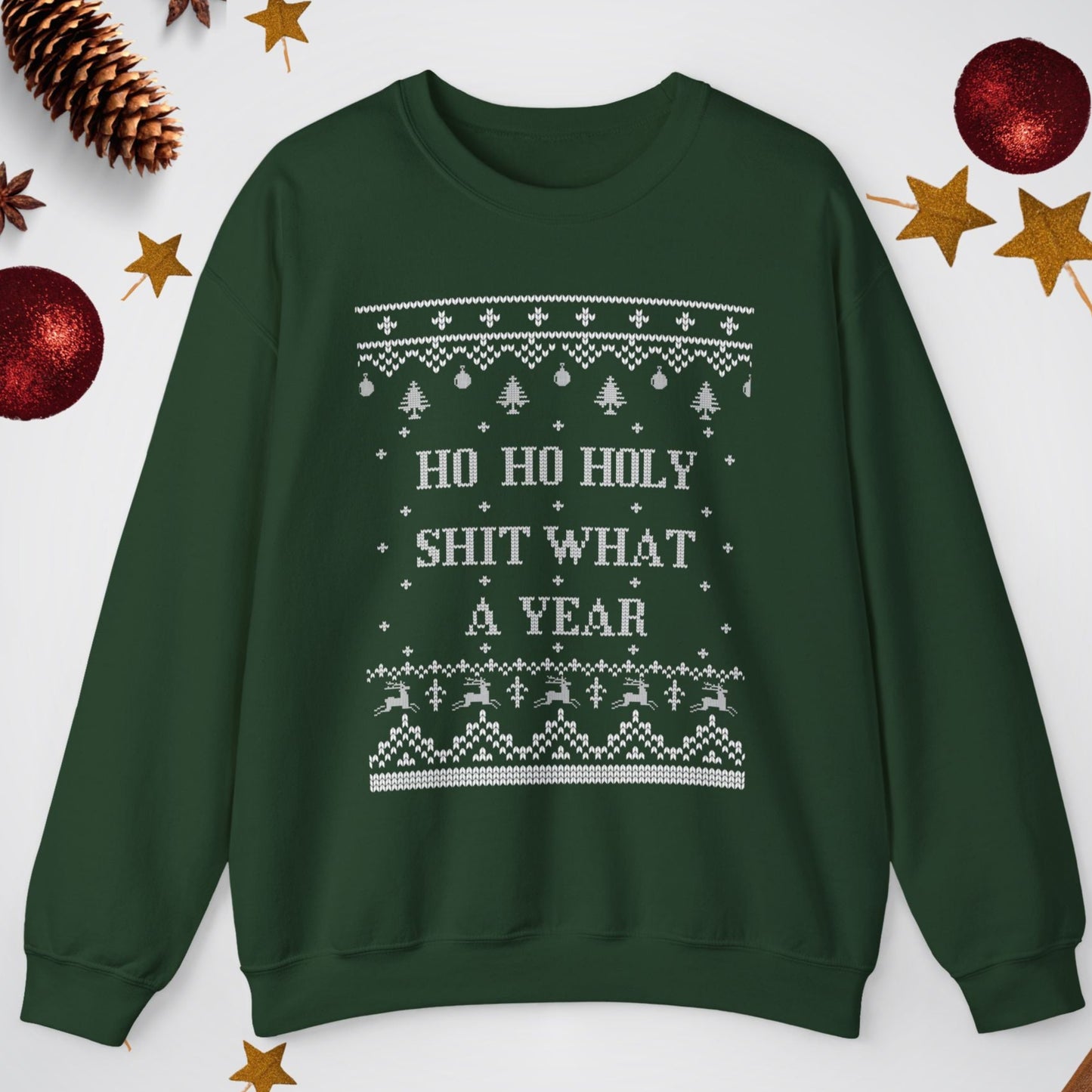 Green sweatshirt with Christmas-themed text and decorations on a white background