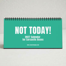 A teal desk calendar with a black spiral binding, featuring the text 'NOT TODAY! 2027 Calendar for Sarcastic Asses' and 'www.corporateass.