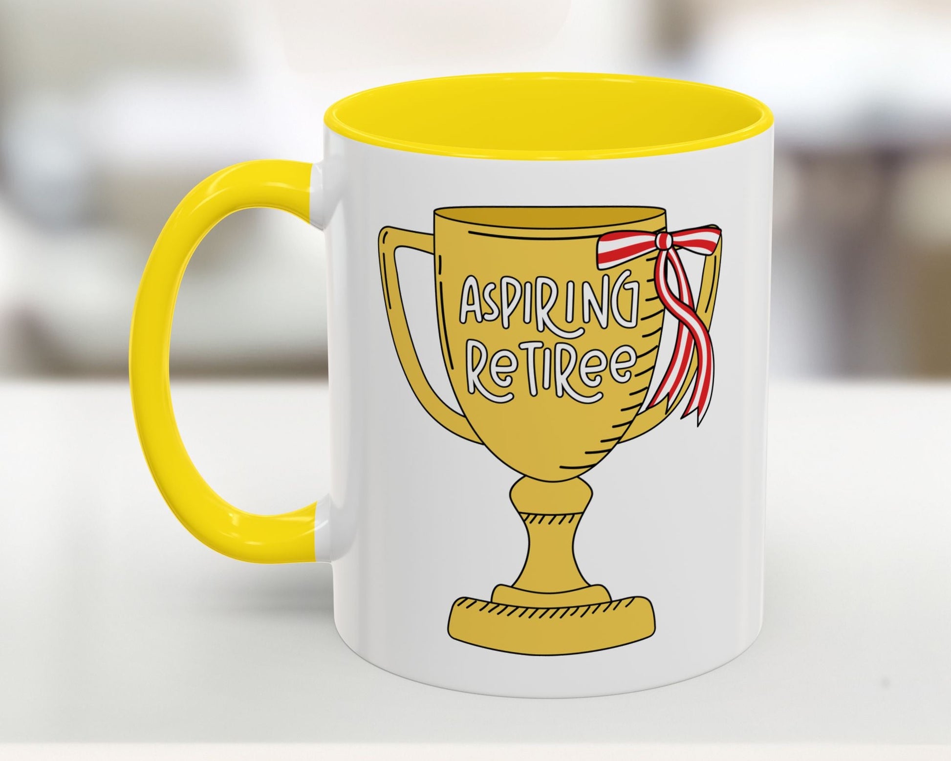 Mug with yellow interior and handle, featuring a trophy design with 'Aspiring Retiree' text.