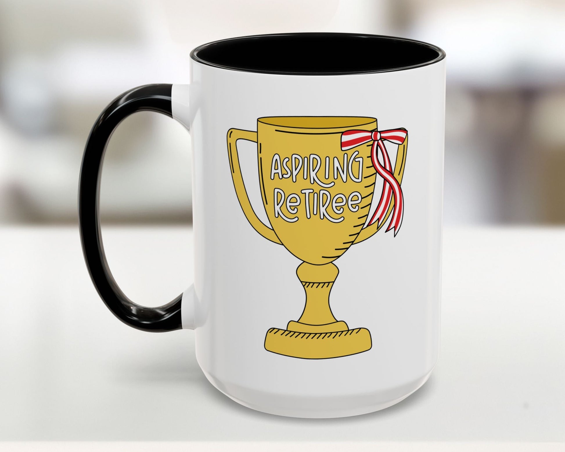 Mug with a trophy design and 'Aspiring Retiree' text on a white background