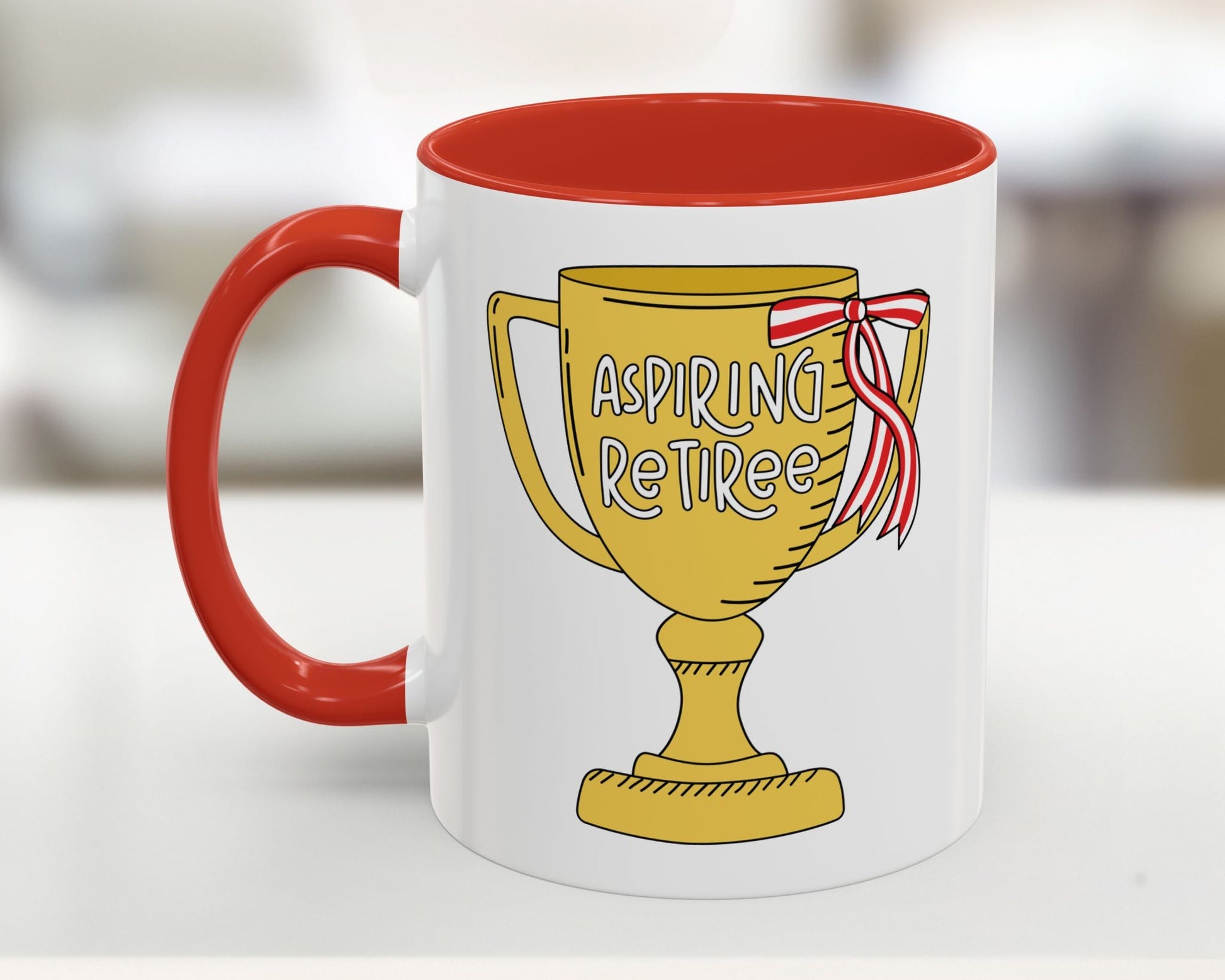 Mug with a trophy design and 'Aspiring Retiree' text on a white background