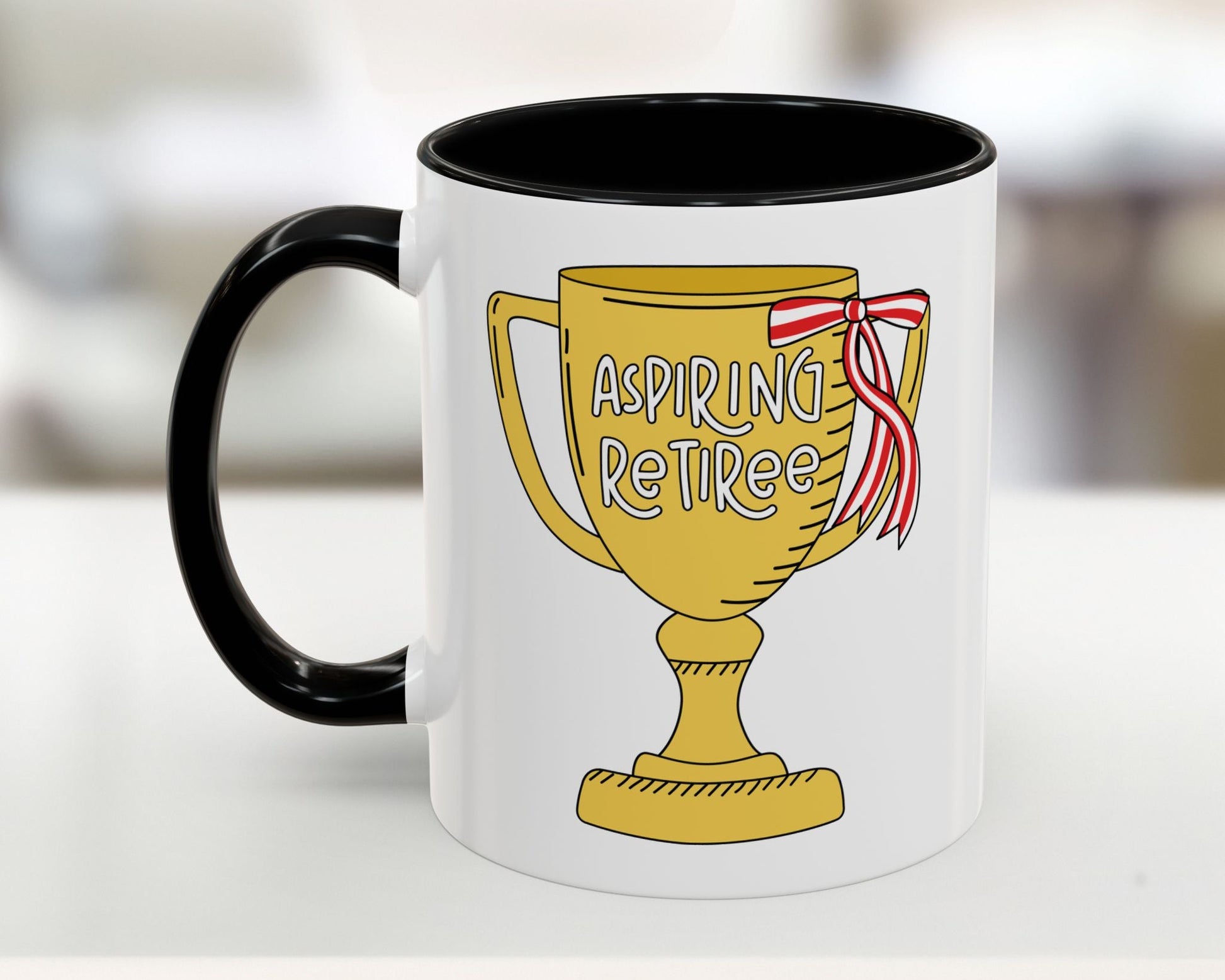 Mug with a trophy design and 'Aspiring Retiree' text on a white background