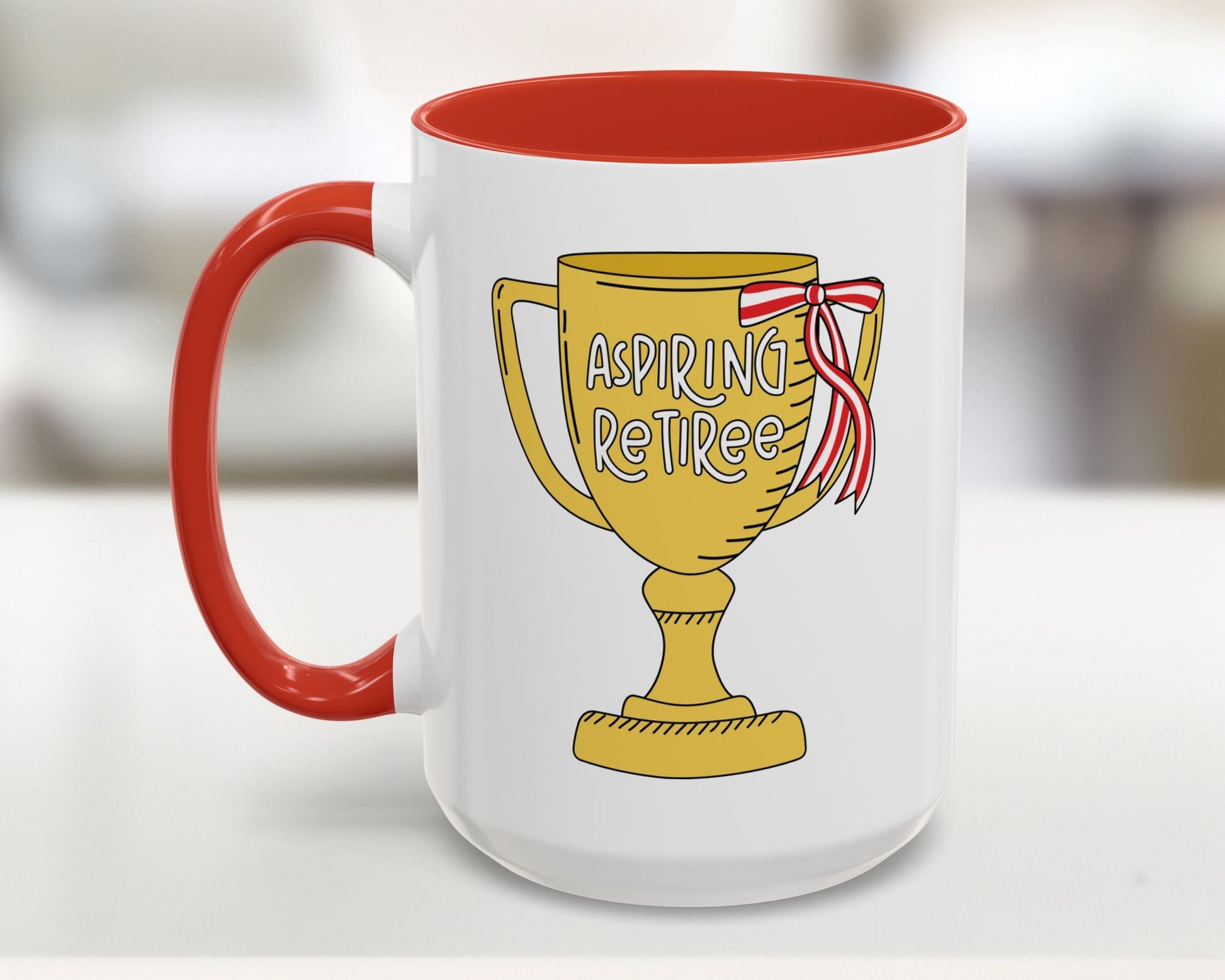 Mug with red handle and 'Aspiring Retiree' trophy design on a white background
