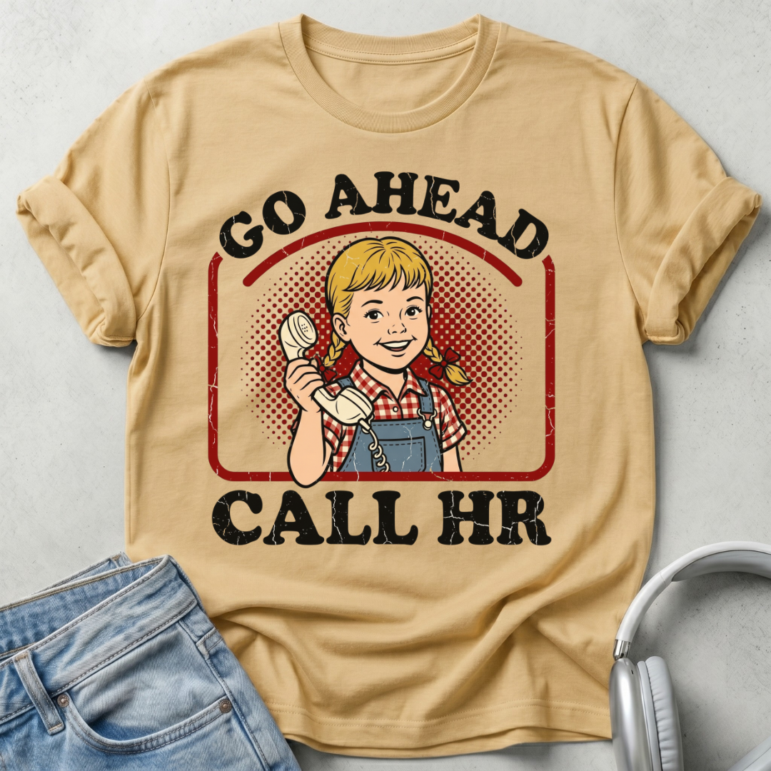Beige t-shirt with graphic design and text 'Go Ahead Call HR' on a light gray background.