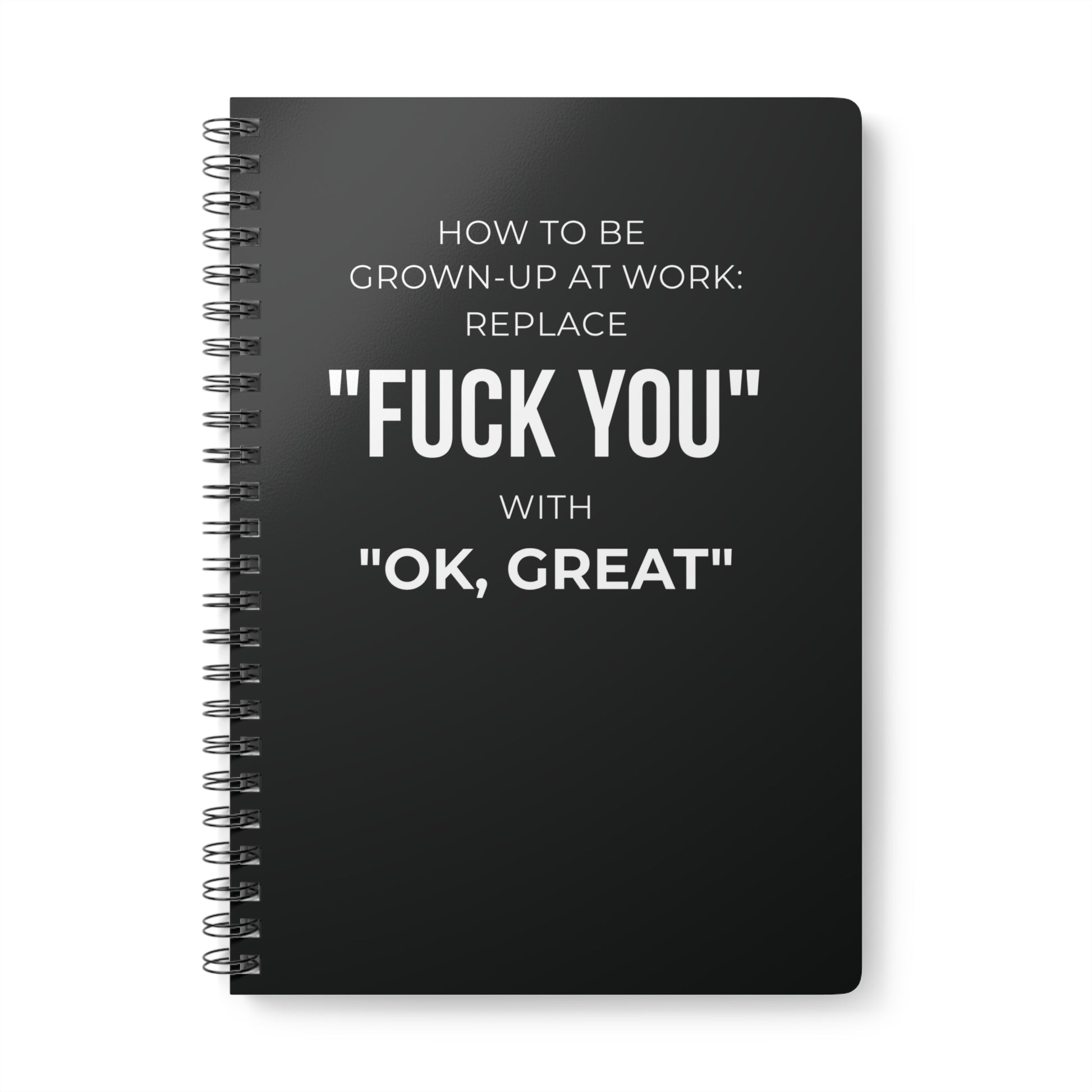 Black notebook with white text on a white background