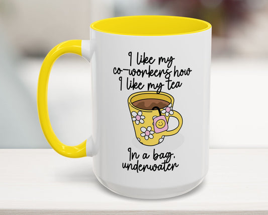 White mug with yellow interior and handle, featuring a humorous quote and coffee cup illustration.