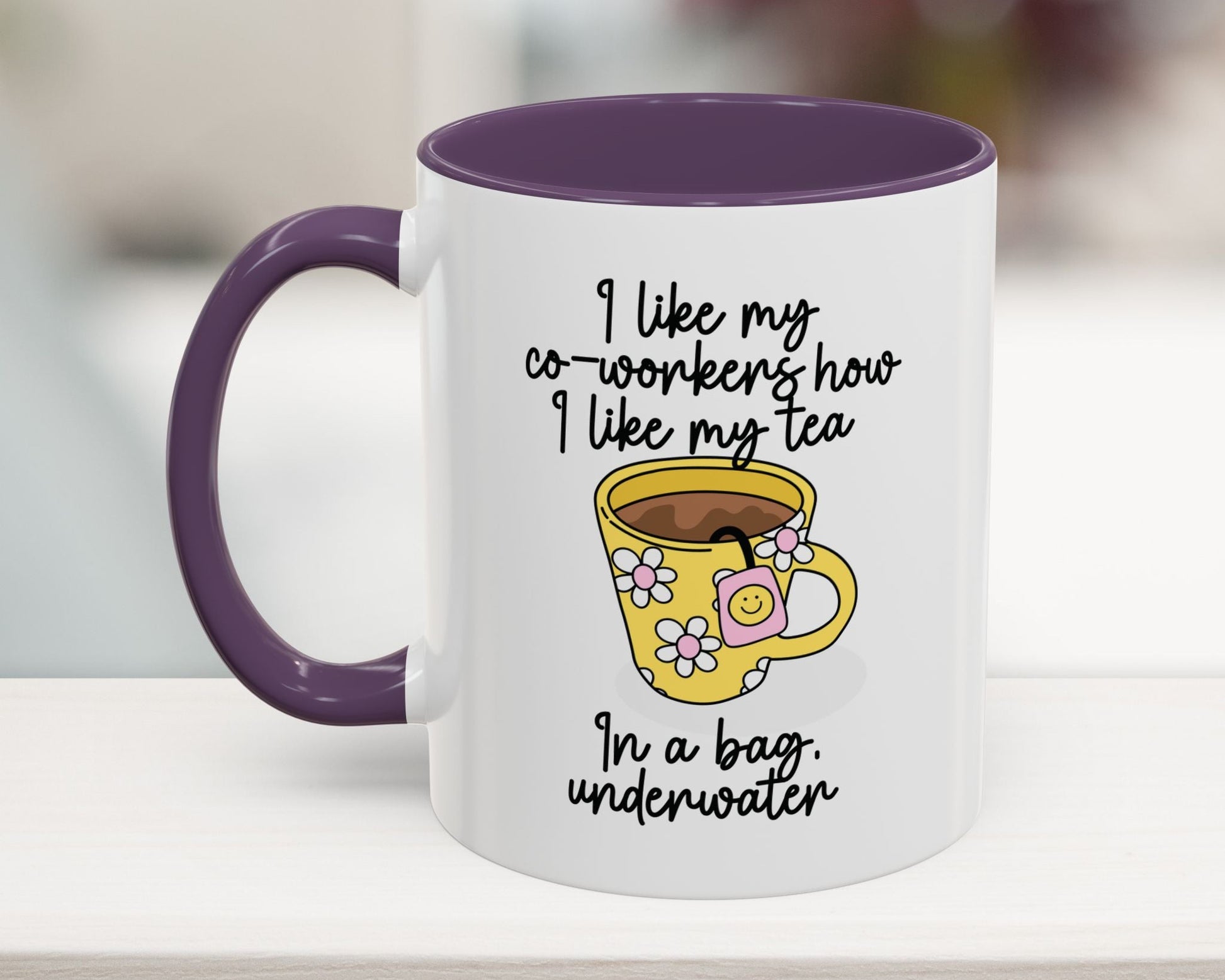 White mug with purple handle and interior, featuring a yellow cartoon cup and humorous text.