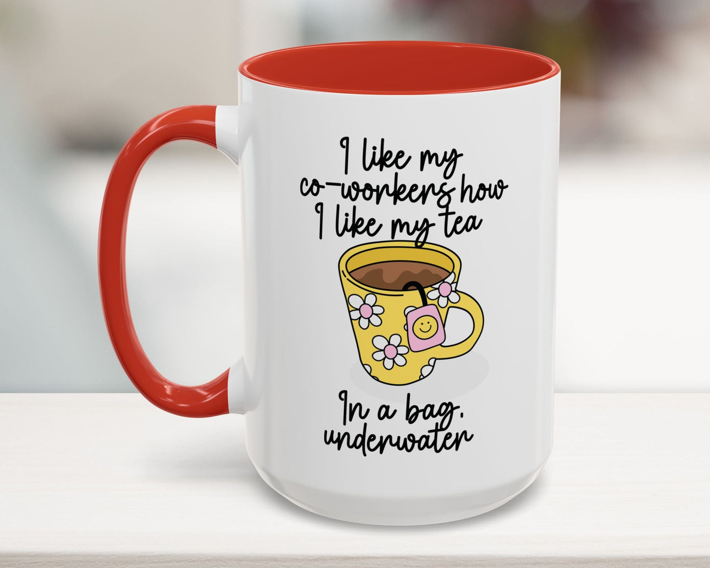 White mug with red interior and handle, featuring a yellow coffee cup illustration and humorous text.