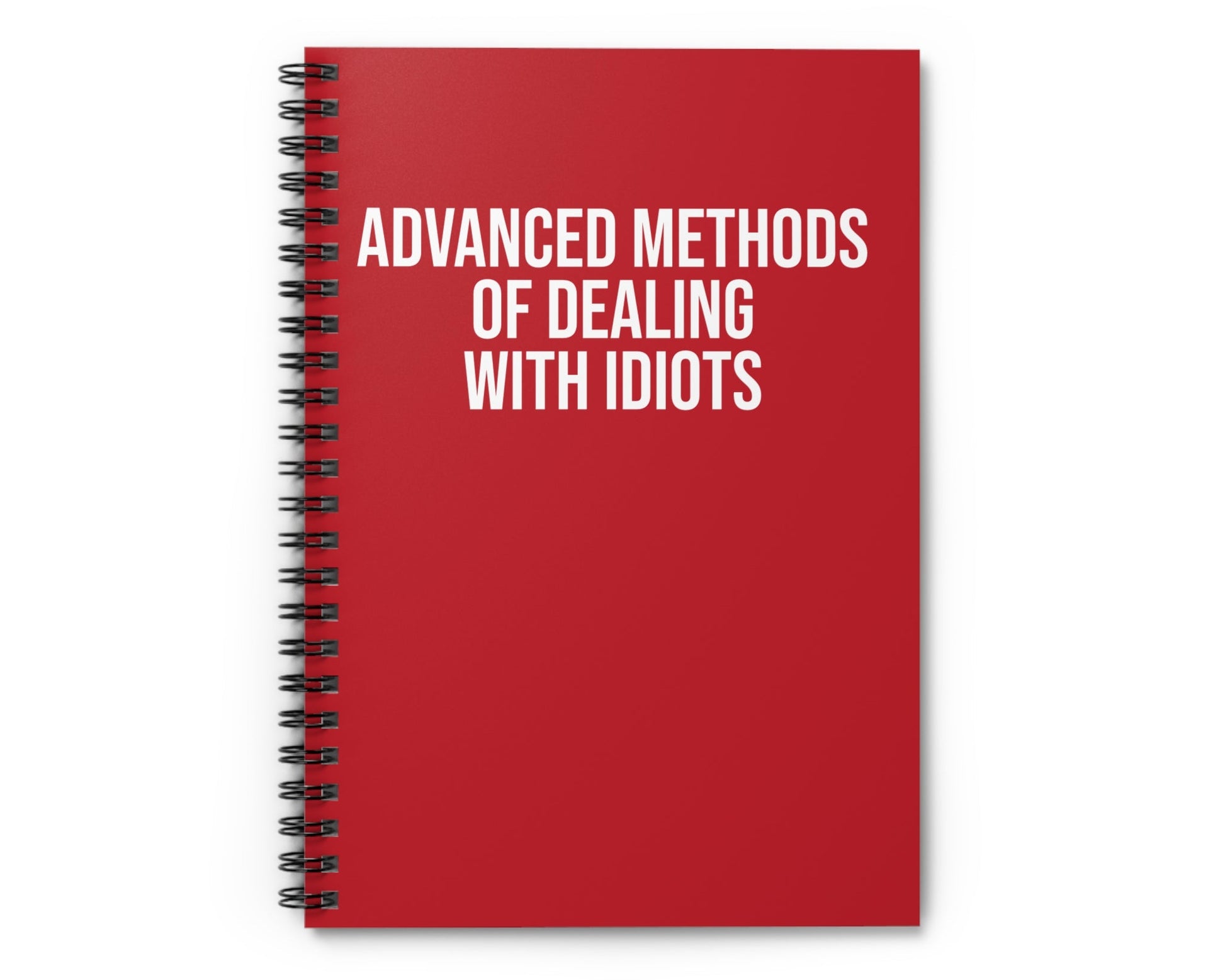 Red notebook with white text on a white background