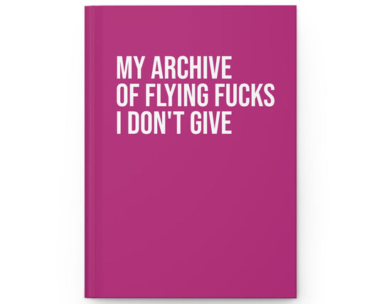 Pink notebook with white text on a white background