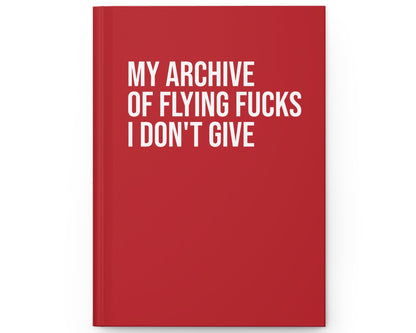 Red notebook with white text on a white background
