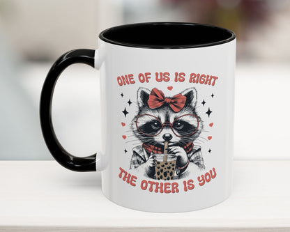 Black 11oz mug with funny raccoon and quote “One of Us is Right, The Other is You”