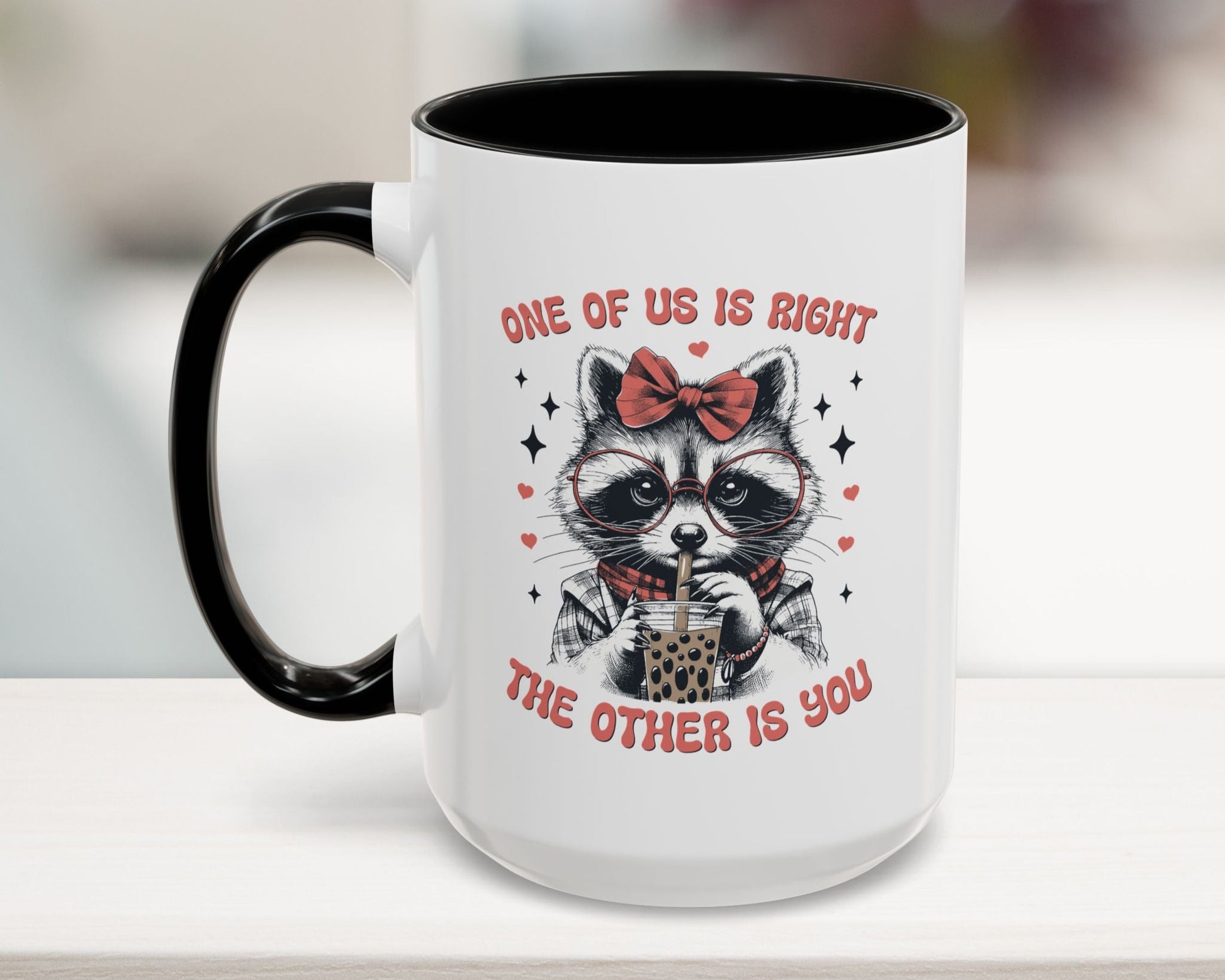 black 15oz mug with funny raccoon and quote “One of Us is Right, The Other is You”