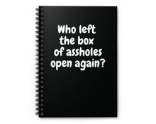 Black spiral notebook with sarcastic “Who left the box of assholes open again?” quote