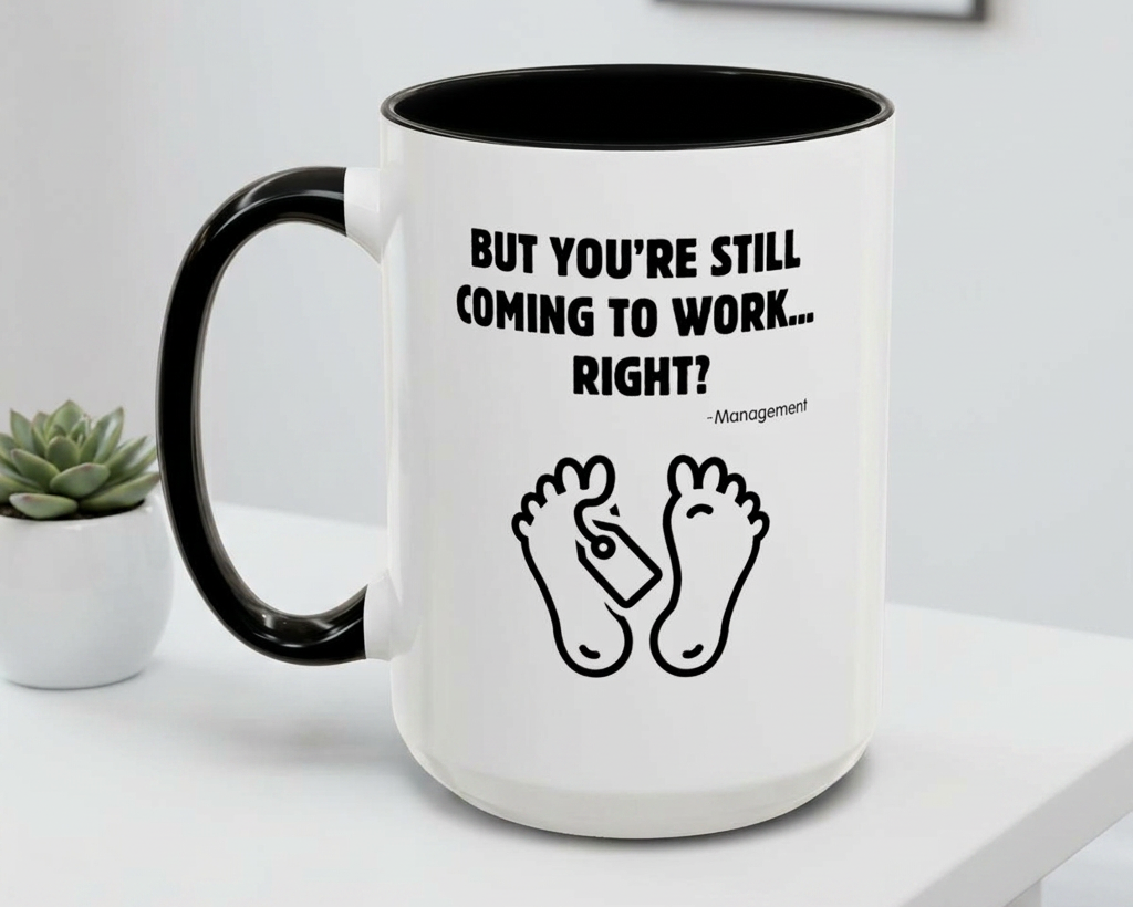 White mug with black interior and handle, featuring text and footprints on a white surface.