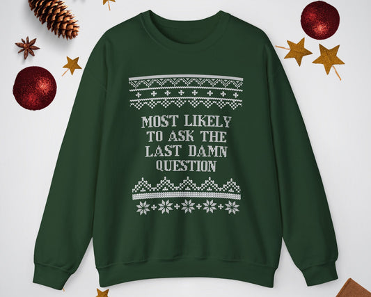 Green sweatshirt with text and patterns on a white background with decorative items.
