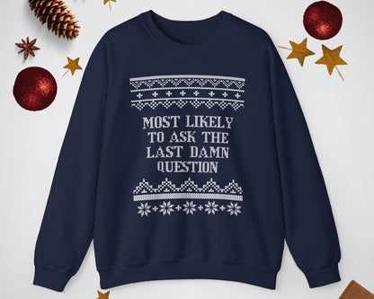 Navy blue sweatshirt with white text and patterns on a light gray background with decorative items.