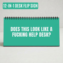 A teal desk flip sign with a black spiral binding and bold white text reading 'DOES THIS LOOK LIKE A FUCKING HELP DESK?' on a light neutral background. A teal label at the top reads '12-IN-1 DESK FLIP SIGN'.