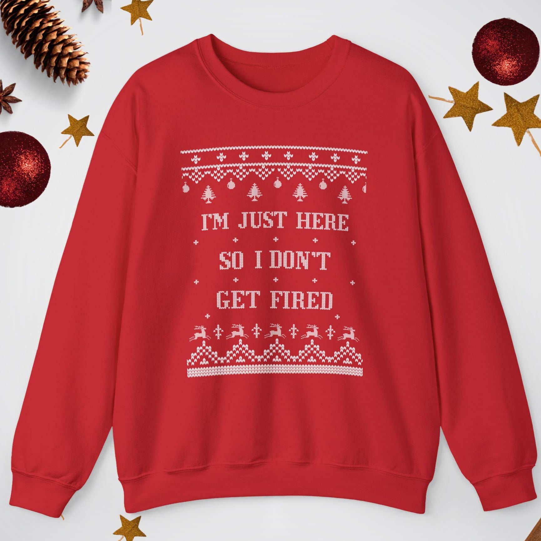Red sweater with Christmas-themed text and decorations on a white background