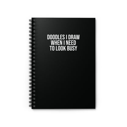 Black spiral notebook with ‘Doodles I Draw When I Need to Look Busy’ text – funny office gift