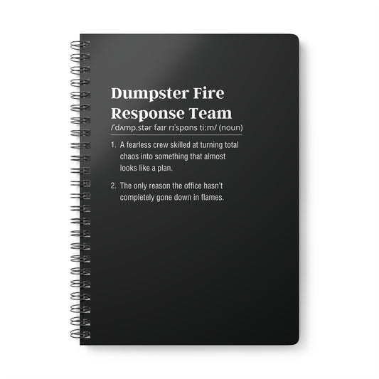Black notebook with white text on a white background