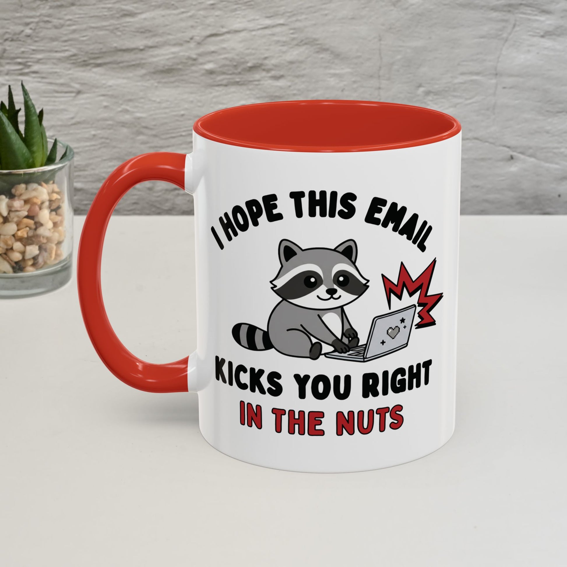 Mug with a raccoon graphic and humorous text on a white surface.