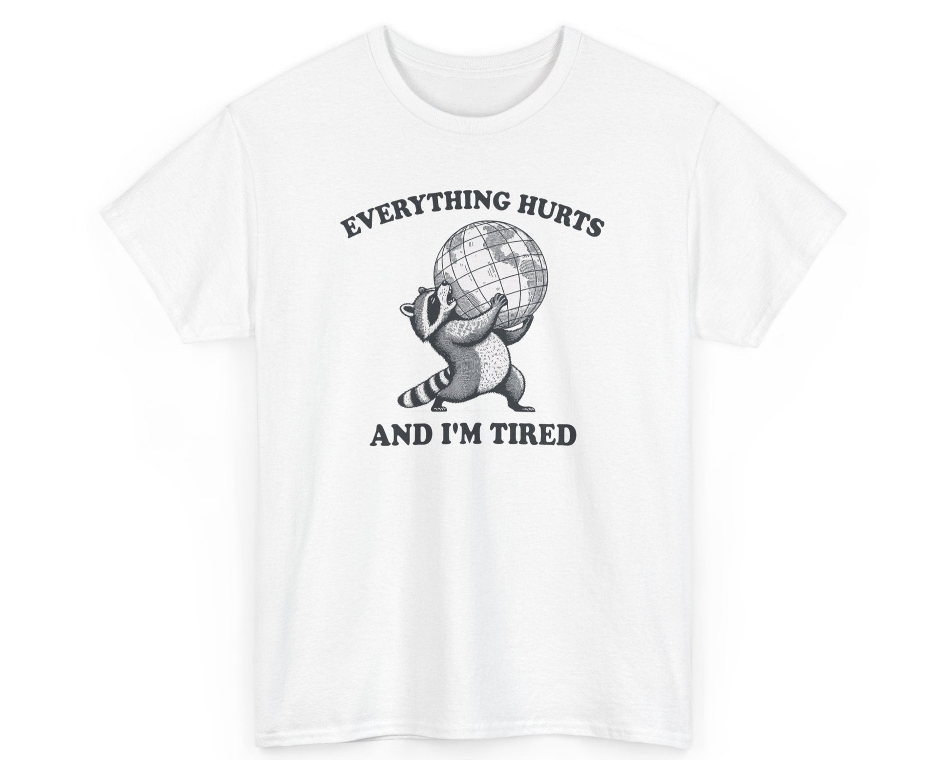 White unisex tee with a tired raccoon and the phrase 'Everything Hurts and I’m Tired,' ideal for anyone feeling exhausted by life.