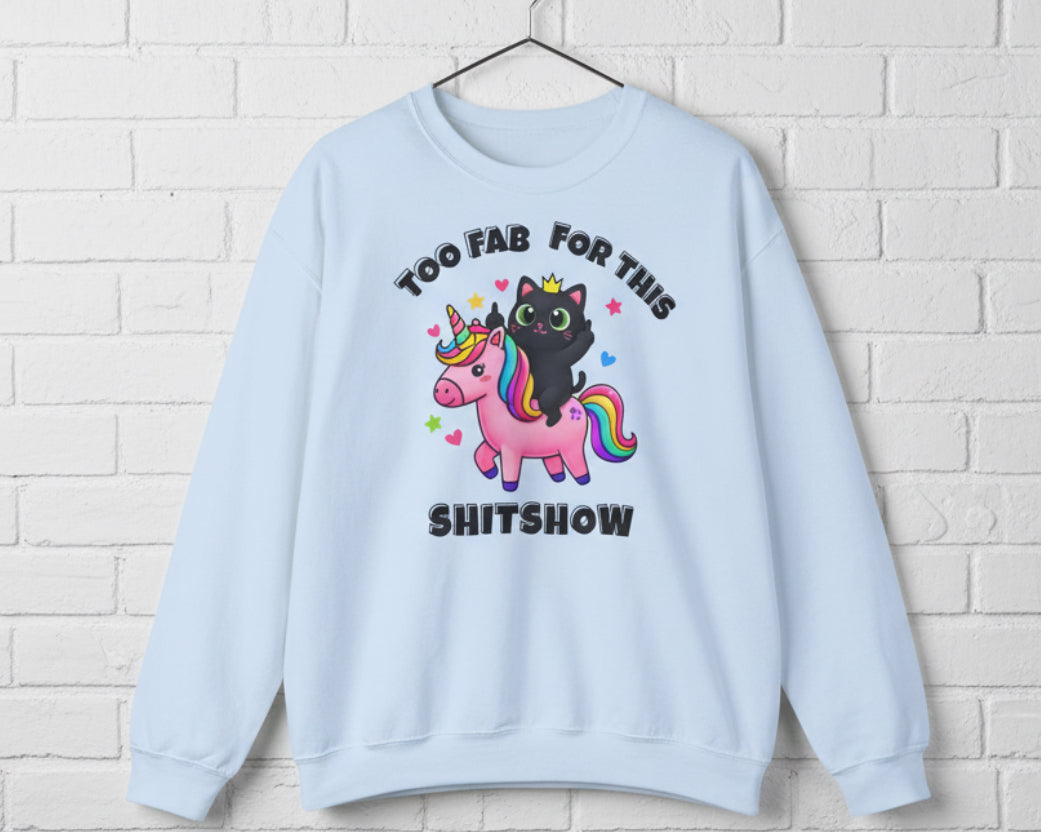 Light blue sweatshirt with a black cat and unicorn graphic and text on a white background