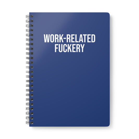 Blue notebook with 'WORK-RELATED FUCKERY' text on a white background