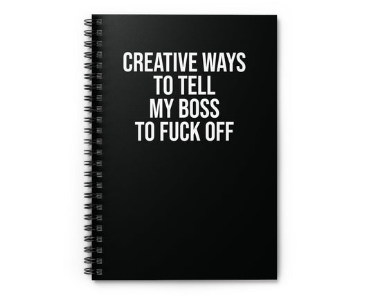 Black notebook with white text on a white background